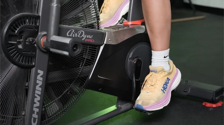 Our tester pedaling on the Schwinn AD7 air bike