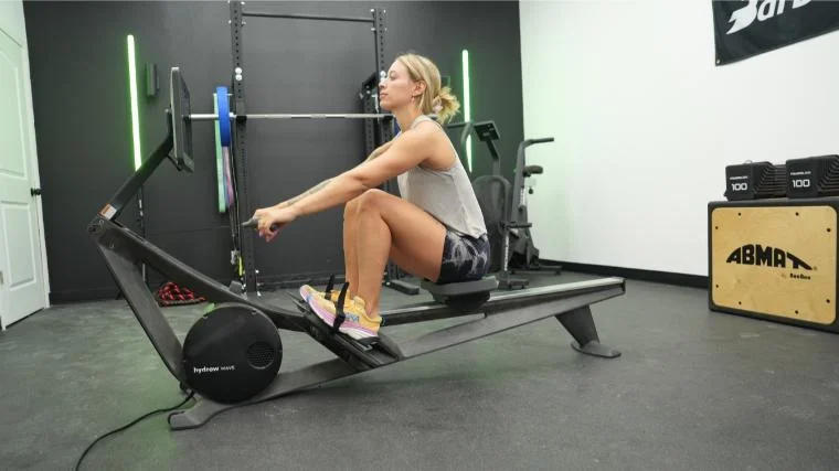 Our tester on the Hydrow Wave Rower.