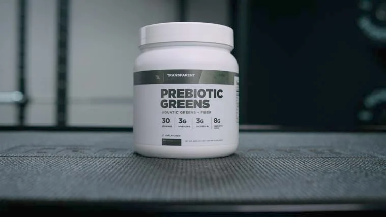 A bottle of Transparent Labs Prebiotic Greens supplements.