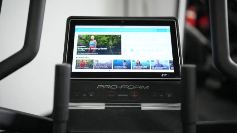 The iFIT fitness app on the 14-inch touchscreen of the ProForm Pro HIIT H14 Elliptical.