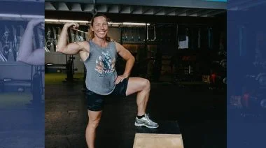 Val Voboril poses while flexing