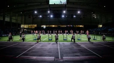 A group of athletes take the field