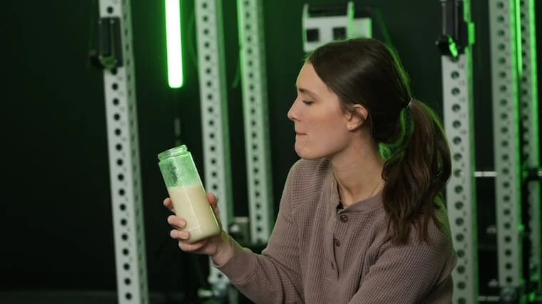 Our tester taking a sip of Optimum Nutrition Gold Standard Whey Protein