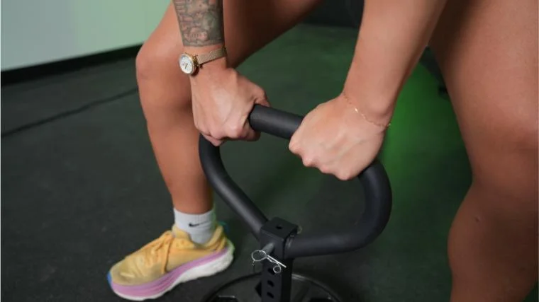 Our tester with the Titan Fitness Plate Loadable Kettlebell.