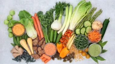 Immune boosting vegan health food with vegetables, herbs, supplement powder, legumes, pasta & dip very high in antioxidants, vitamins, minerals, smart carbs, carotenoids, protein & lycopene.
