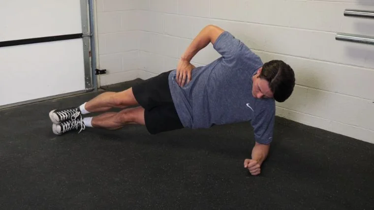 Jake Herod doing the side plank.