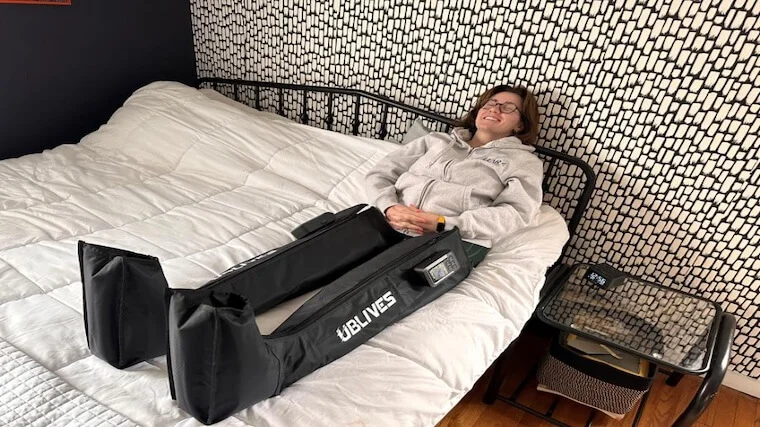 Our tester taking in a recovery session with the Ublives SoleFlex Relax Air Compression Boots