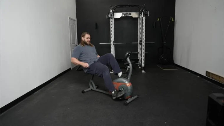 Our tester riding the Marcy ME-709 recumbent exercise bike.