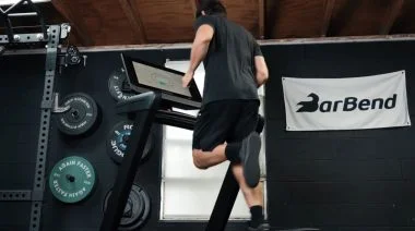 A person running on a treadmill.