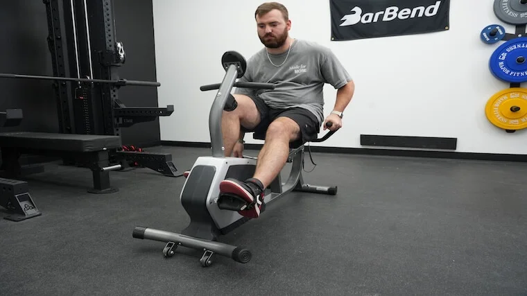 Our tester getting a workout in on the Sunny Health and Fitness Essential Recumbent Bike