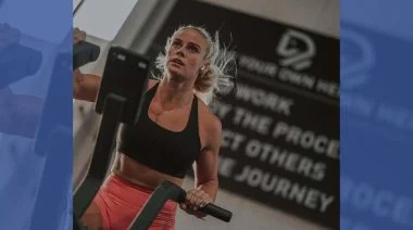 A woman is shown working out
