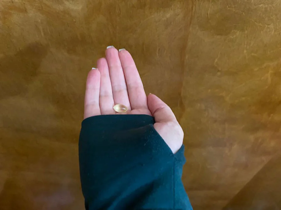 bb tl d3 k2 capsule in palm