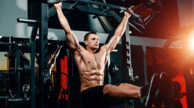 A person doing hanging leg raise