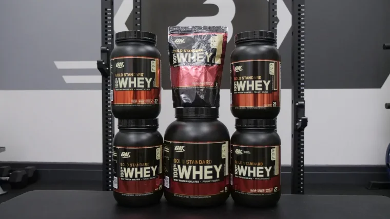 Stack of Optimum Nutrition Whey Protein flavors