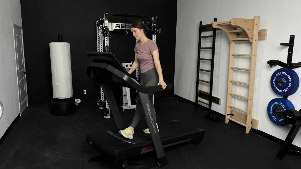 Our BarBend Tester working out on a ProForm Pro 9000 Treadmill.