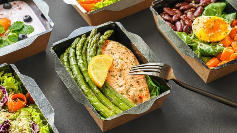 Meals prepped in containers and ready to eat.