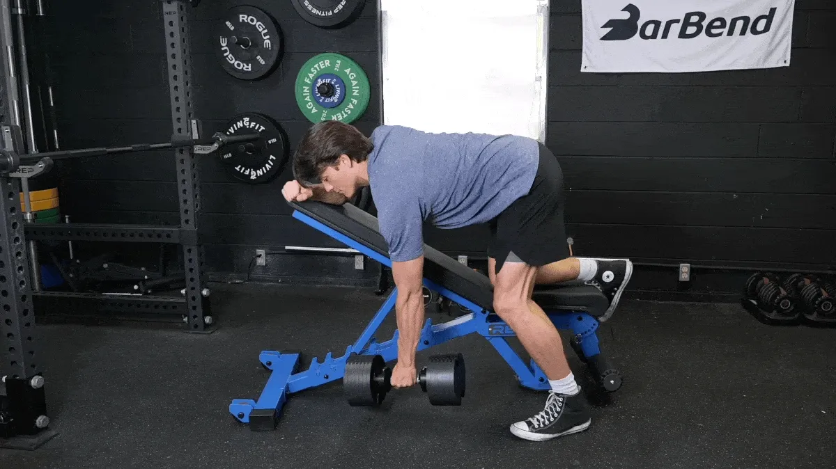 A person performing the Kroc row movement.