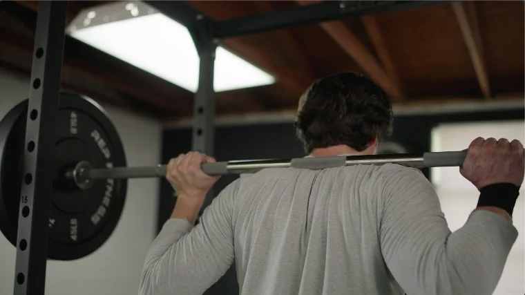 Jake Squatting With the REP Fitness Power Bar