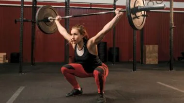 A CrossFitter doing an overhead squat.