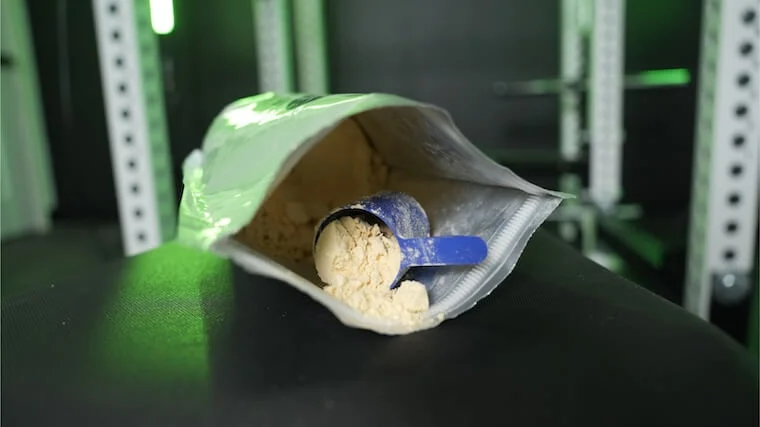 ritual-essential-pregnancy-+-postpartum-protein-scoop-in-open-bag (1) An open bag of Ritual Essential Daily Shake Pregnancy and Postpartum