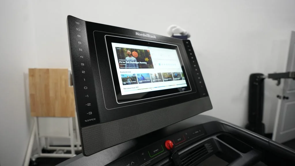 A NordicTrack treadmill screen in the testing center.