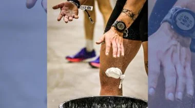 An athlete is shown wearing a smart watch