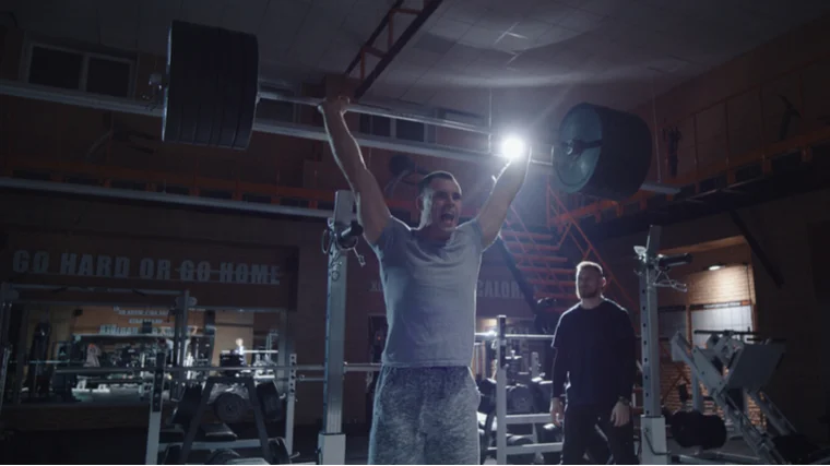 man performing push press 