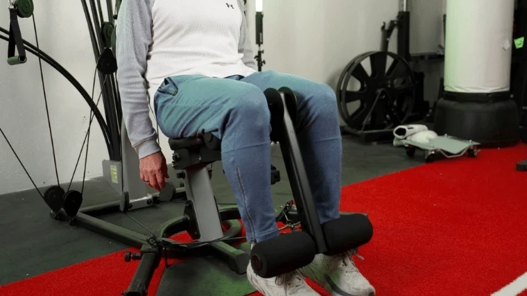 Our tester performing some lower body workouts on the Bowflex Xtreme 2 SE