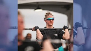 Lucy Campbell is shown lifting at a competition