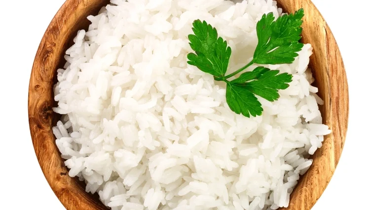 White rice in wooden bowl.