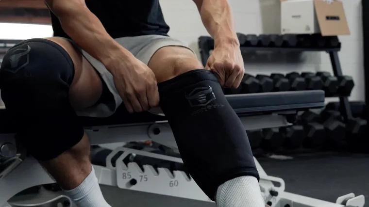 putting_on_the_iron_bull_7mm_knee_sleeves