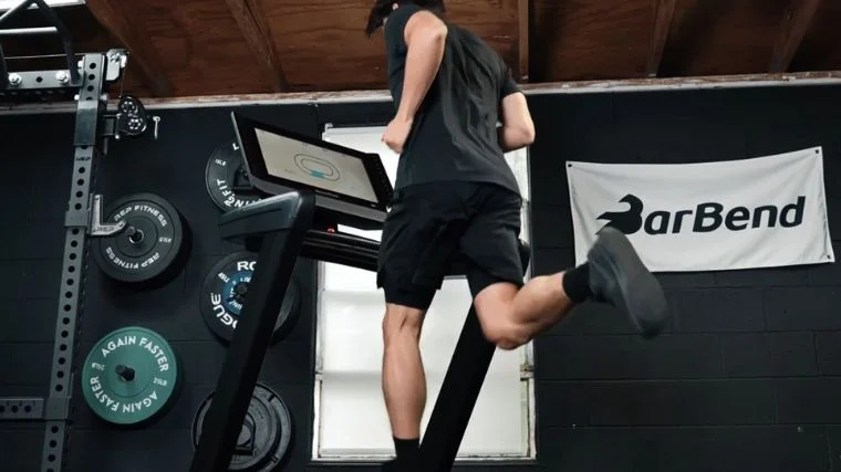 A person running on a treadmill.
