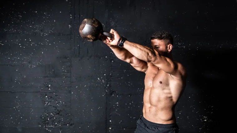 A person doing a kettlebell swing exercise