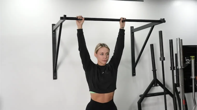 Our tester training with the Titan Fitness Wall-Mounted Pull-Up Bar