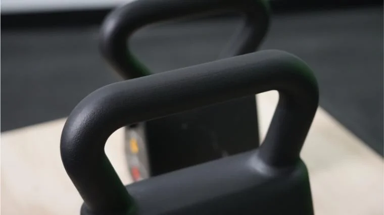The handles of the PowerBlock Adjustable Kettlebells.