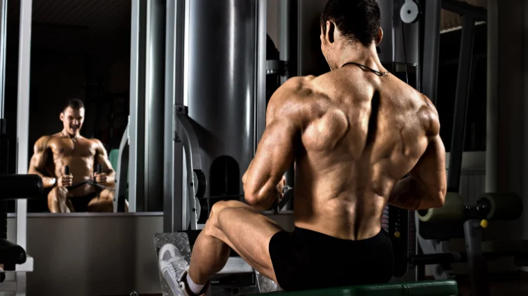 Athlete targets rhomboid muscles with seated row