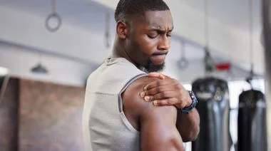 A man experiencing shoulder pain