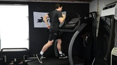 A person running on a treadmill.