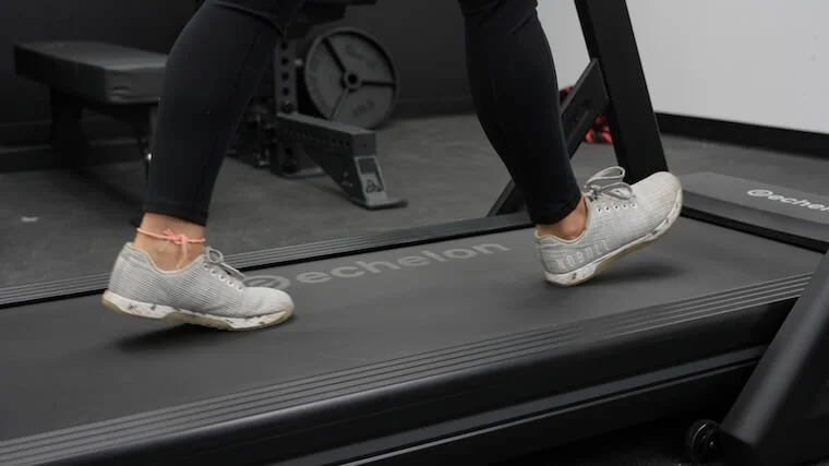 Our tester training atop an Echelon Stride series treadmill