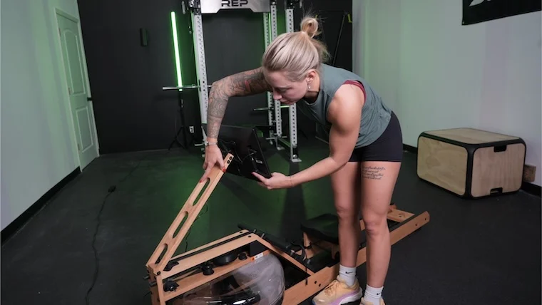 a person adjusting the Ergatta Lite