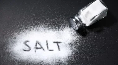 Salt spilled from a dispenser.