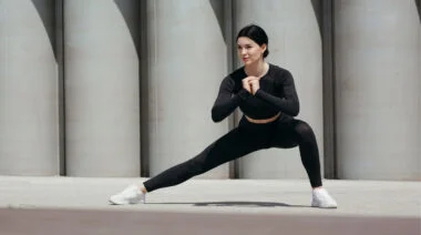 Woman performing lateral lunge