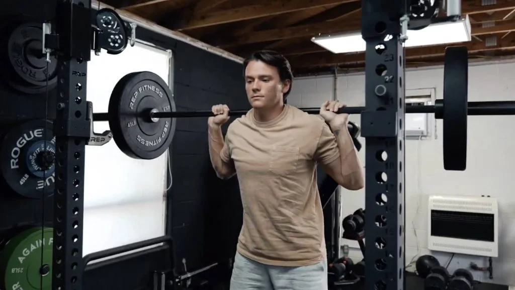 squatting with the rep fitness double black diamond power bar
