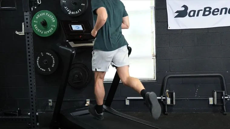 A person running on a treadmill.