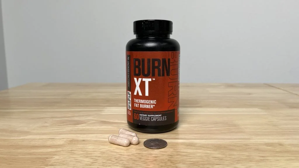 Jacked Factory Burn size comparison next to quarter.