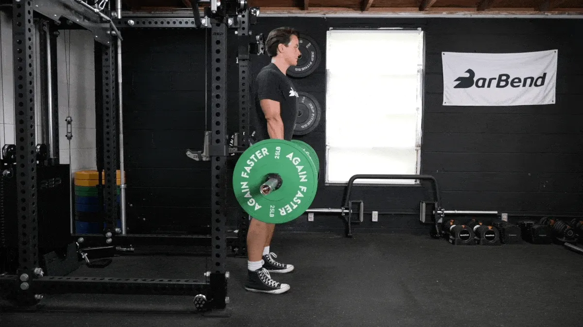 BarBend's Jake Herod performing the banded romanian deadlift.