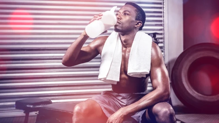 Athlete with a meal replacement shake.