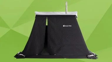a portable at-home sauna on a green background