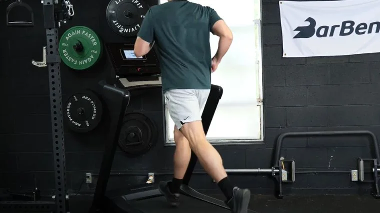 A person running on a treadmill.