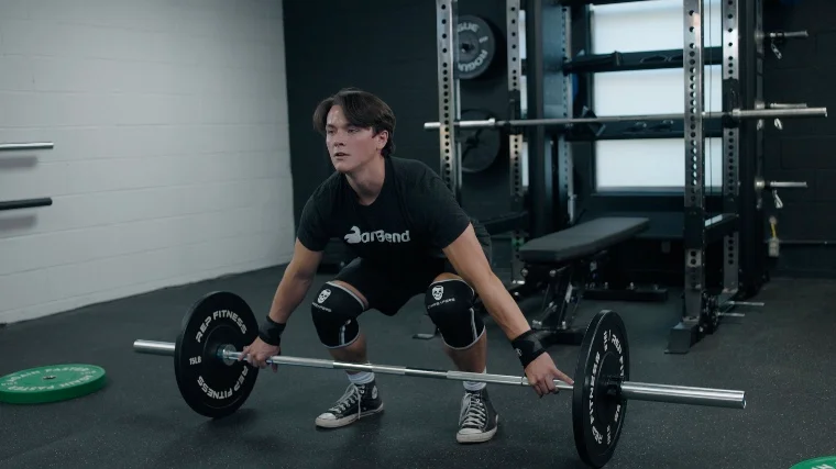 Jake Working Out with the Gymreapers 7mm Knee Sleeves